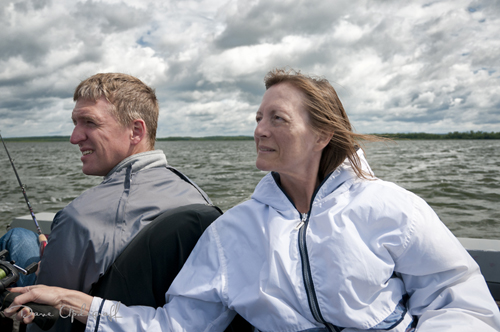 Jeanne holds the fishing pole once