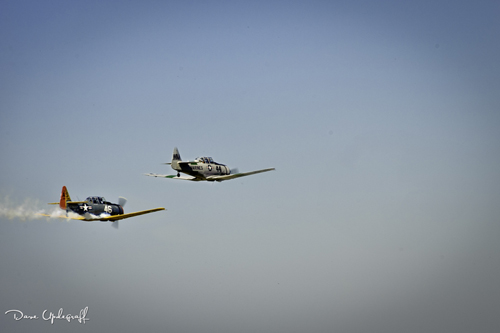 A pair of T28s over fly the DBQ airport