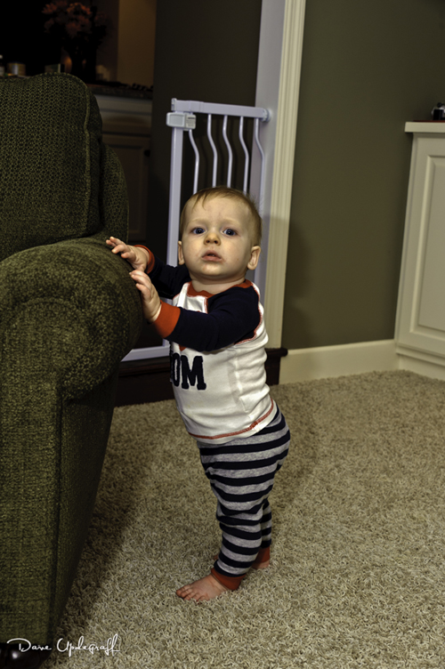 Practicing his standing