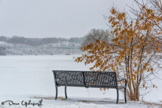 A Bench overlooking the frozen Mississippi
